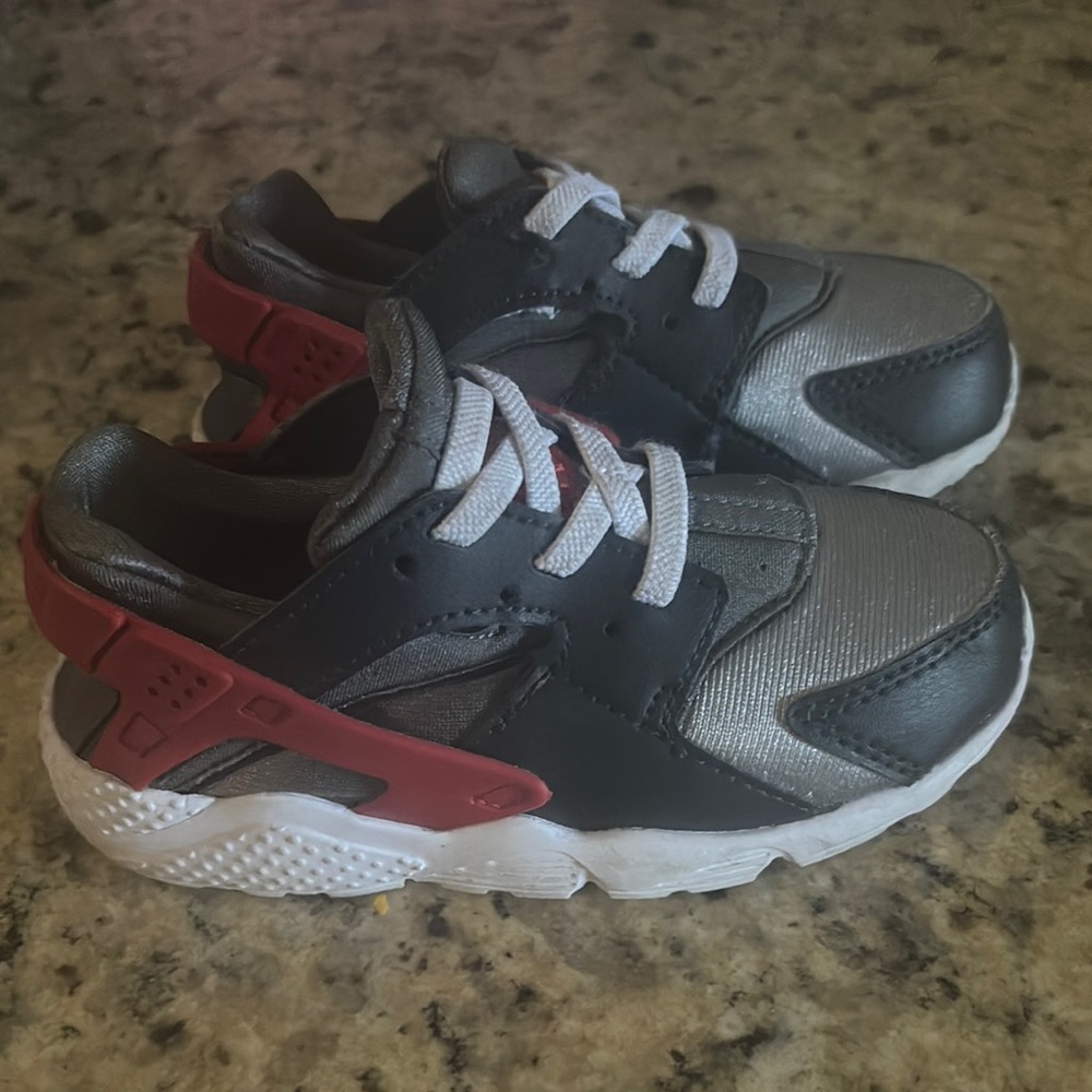 Black and Red Sneakers with Mesh Upper and Cushioned Sole
